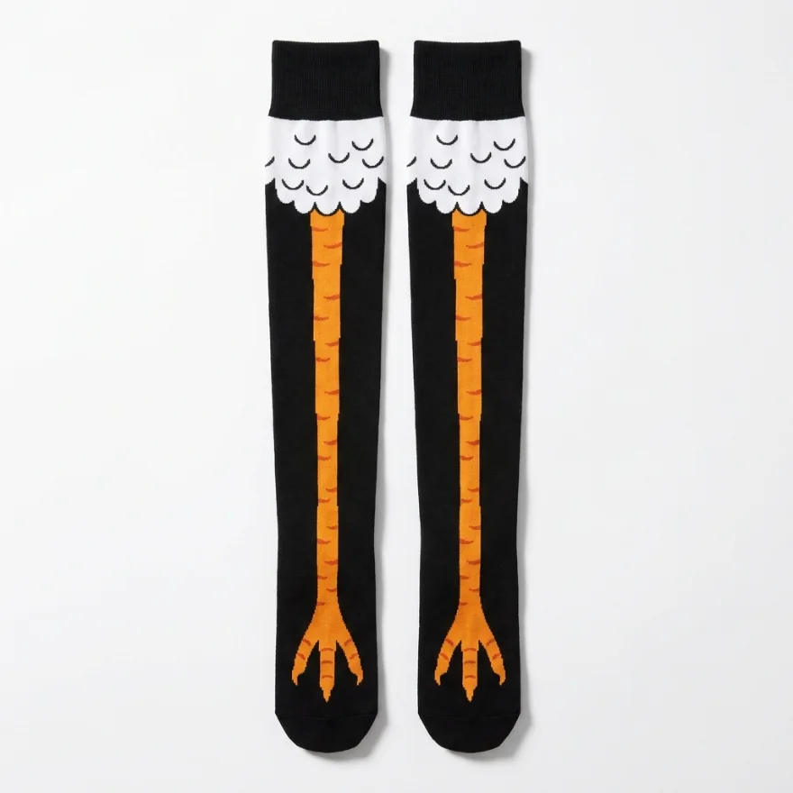 A pair of custom black high-knee socks with a novelty orange chicken-leg graphic