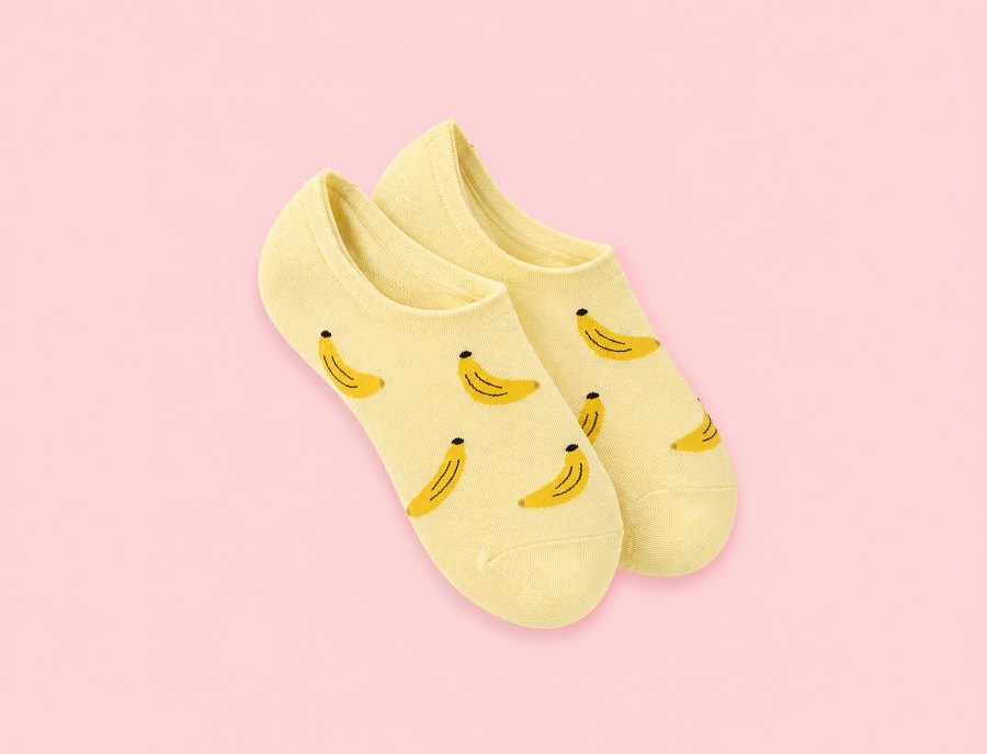 Custom yellow no-show socks with a banana pattern